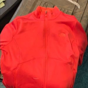 North face zip up. Never worn.